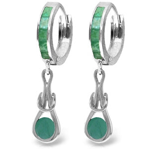 14K. SOLID WHITE GOLD HUGGIE EARRINGS WITH DANGLING EMERALDS